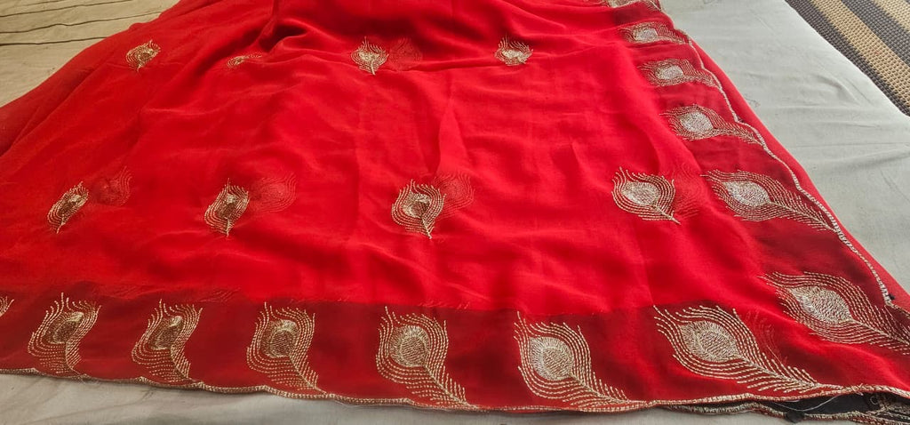 Elegant Red Chiffon Saree with Golden Peacock Motif & Designer Border