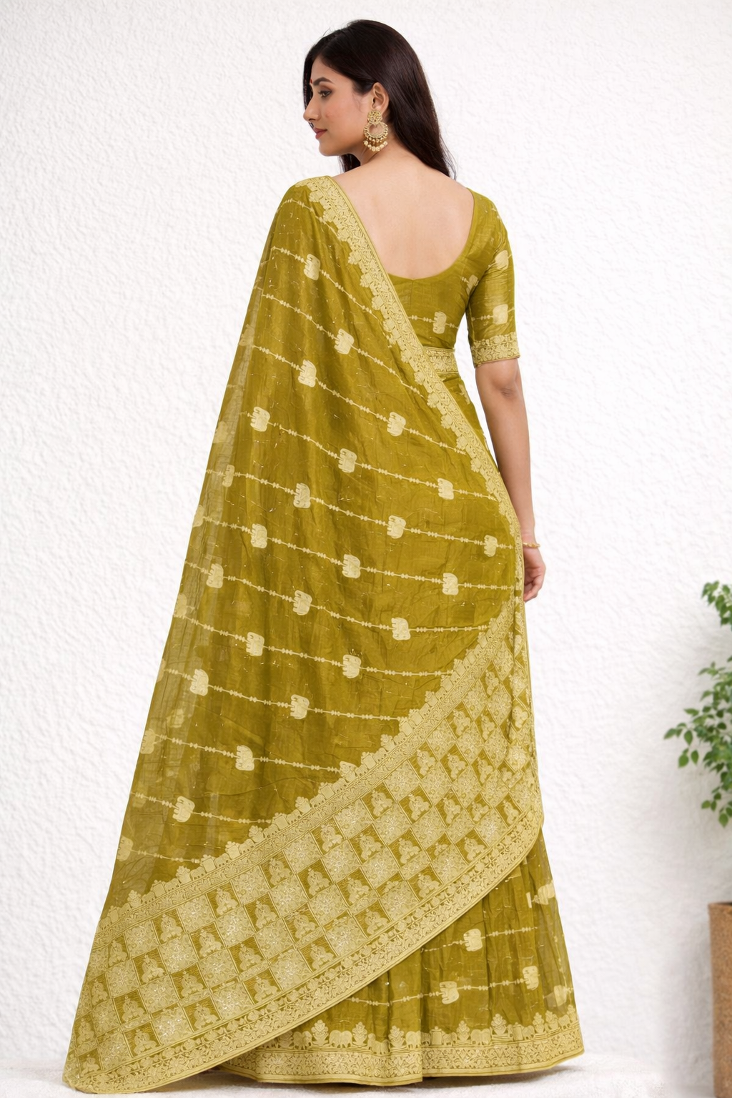 Olive Green Designer Saree with Gold Elephant Motifs & Rich Border